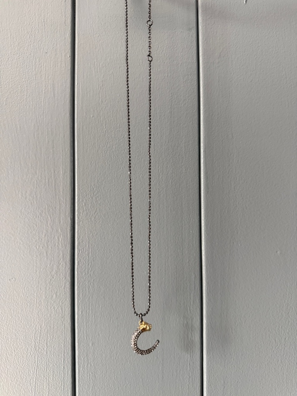 Stella & Dot Dainty Two-Tone Panther Horseshoe  Pendant Necklace - Gold & Silver